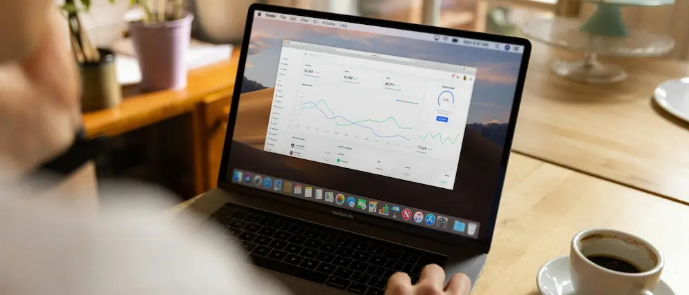 Small business owner checking Google rankings to see if their website needs SEO